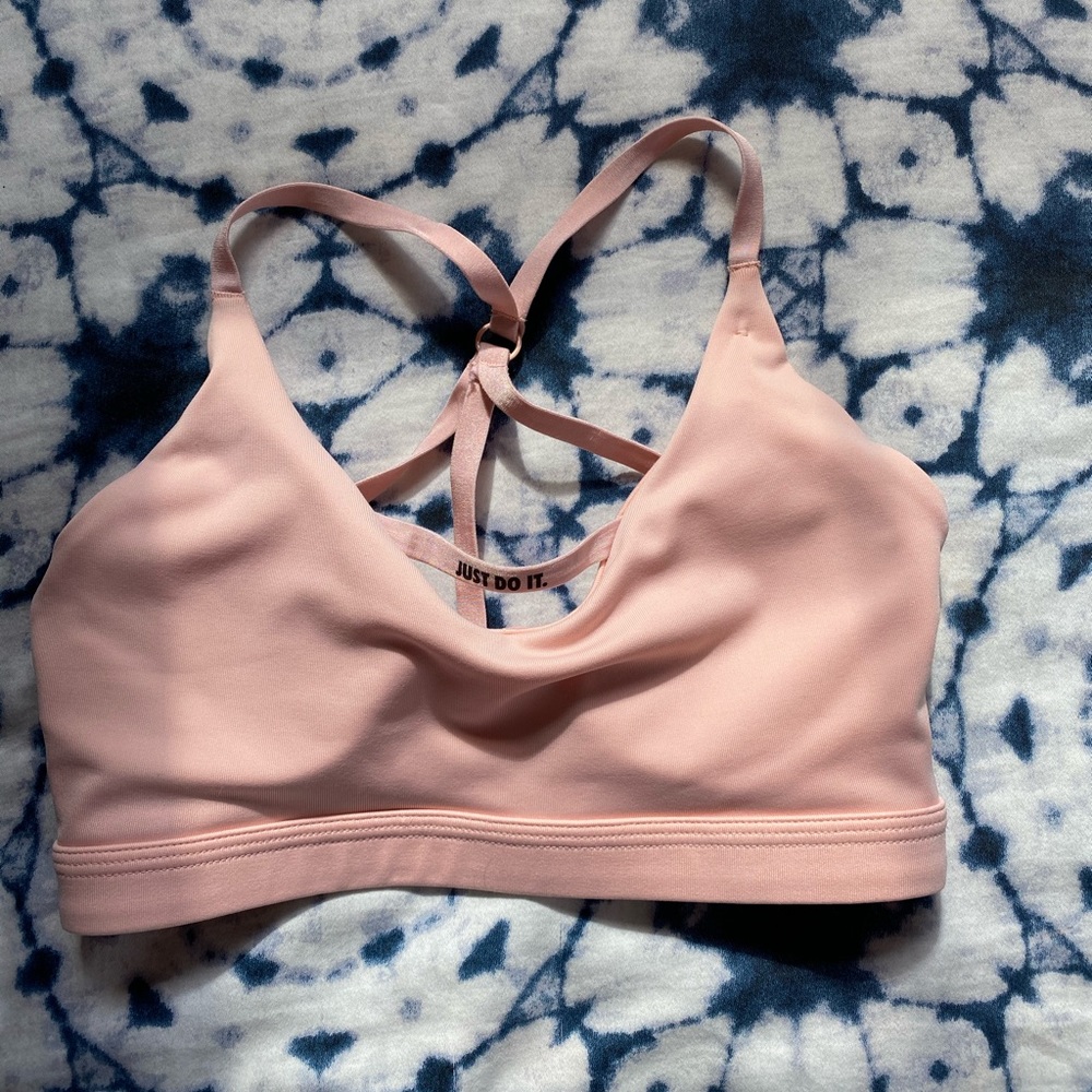 Light pink NIKE dri-fit women’s sports bra